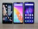 Tre moderne smartphones i forskellige farver